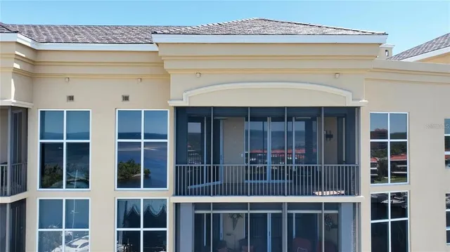 an aerial view of a city with ocean view