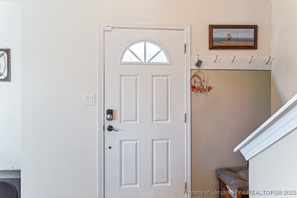 335 Cape Fear Road Raeford, NC 28376 - Photo 4 of 39 a view of front door with a door