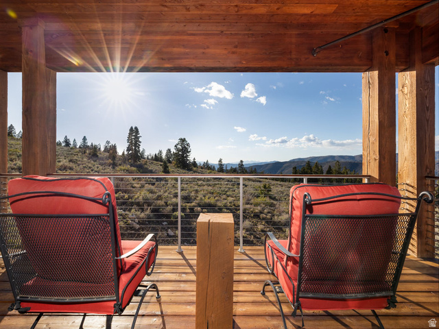 22677 East Snowbird Drive, Unit 47 Helper, UT 84526 - Photo 4 of 43 Wooden deck featuring a mountain view