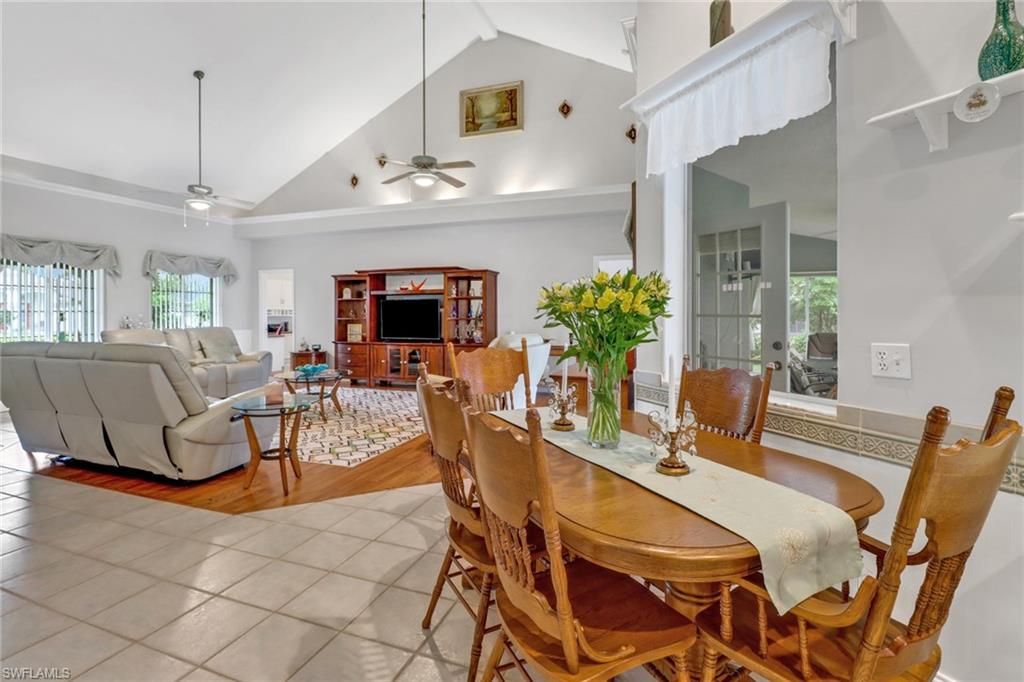 17532 Ingram Road Fort Myers, FL 33967 - Photo 14 of 46 a view of a dining room with furniture window and wooden floor
