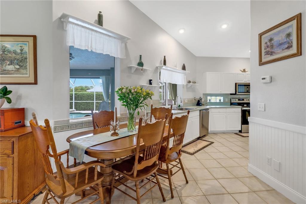 17532 Ingram Road Fort Myers, FL 33967 - Photo 16 of 46 a dining room with furniture and window
