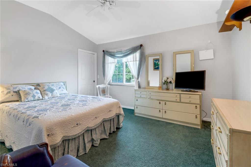 17532 Ingram Road Fort Myers, FL 33967 - Photo 21 of 46 a bedroom with a bed and a flat screen tv