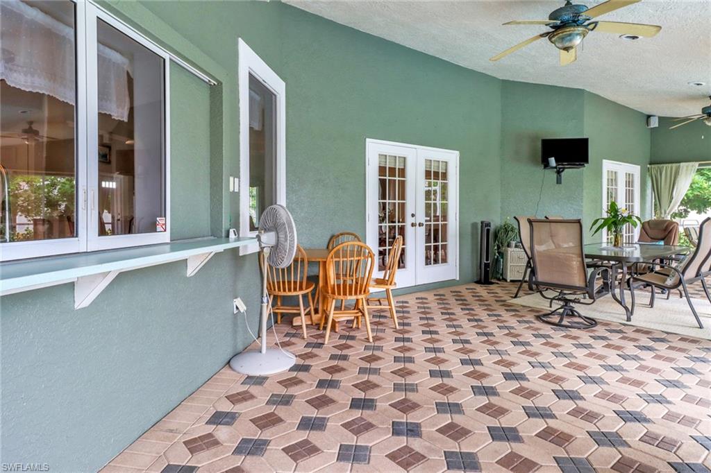 17532 Ingram Road Fort Myers, FL 33967 - Photo 27 of 46 a chair and table in a room