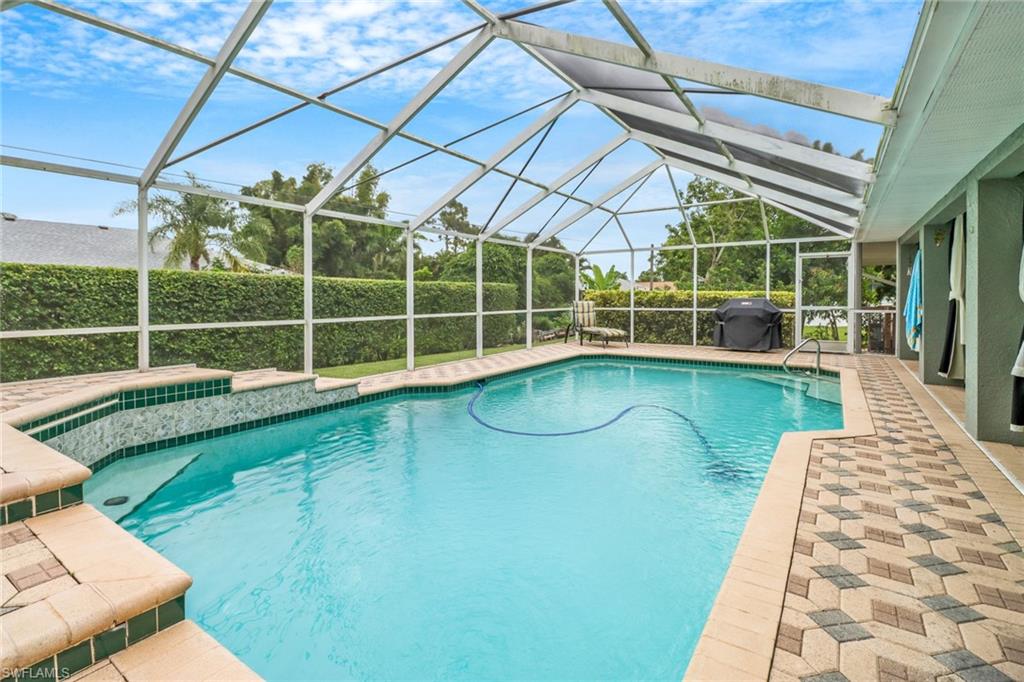 17532 Ingram Road Fort Myers, FL 33967 - Photo 29 of 46 a view of a swimming pool with an outdoor seating