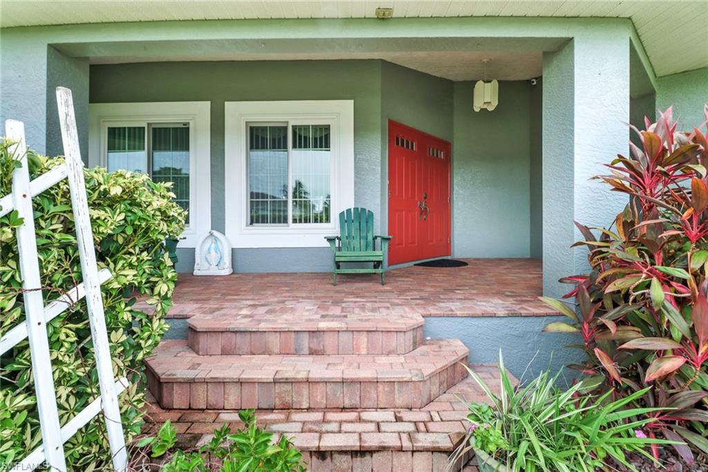 17532 Ingram Road Fort Myers, FL 33967 - Photo 4 of 46 a view of a house with potted plants