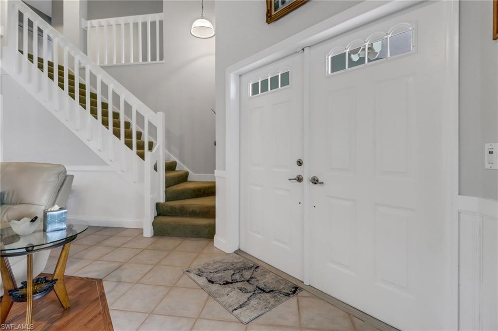 17532 Ingram Road Fort Myers, FL 33967 - Photo 5 of 46 a view of entryway with stairs and furniture