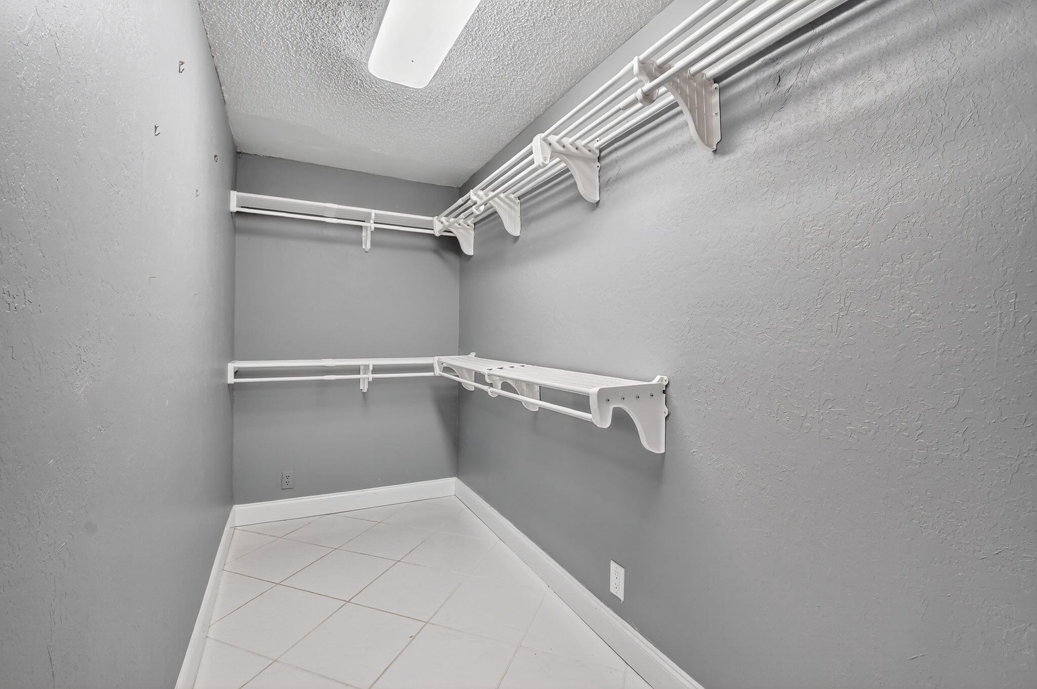 624 Flanders North Delray Beach, FL 33484 - Photo 19 of 44 a view of walk in closet