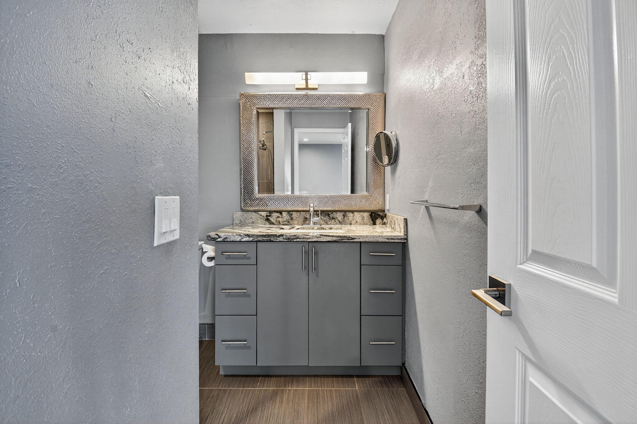 624 Flanders North Delray Beach, FL 33484 - Photo 21 of 44 a bathroom with a sink and a mirror