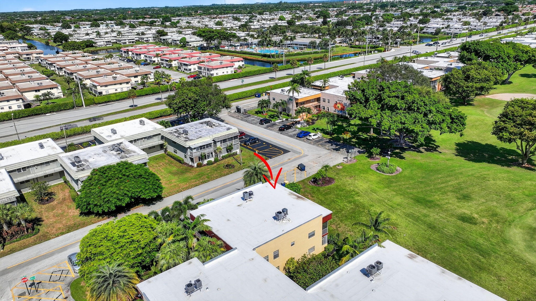 624 Flanders North Delray Beach, FL 33484 - Photo 31 of 44 an aerial view of a house with a garden and lake view