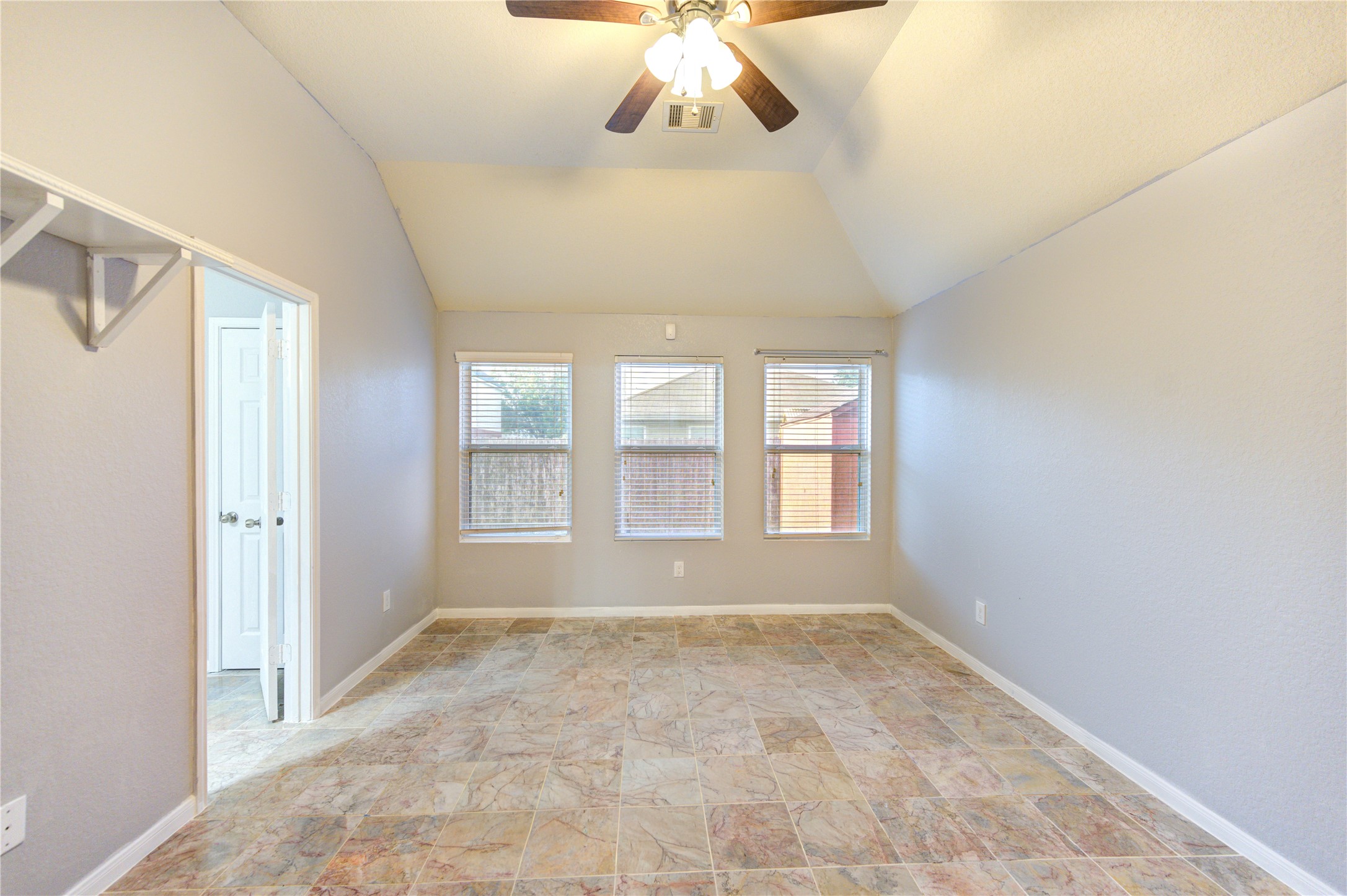 2102 Indian Clearing Trail Rosenberg, TX 77471 - Photo 16 of 29 a view of an empty room with a window