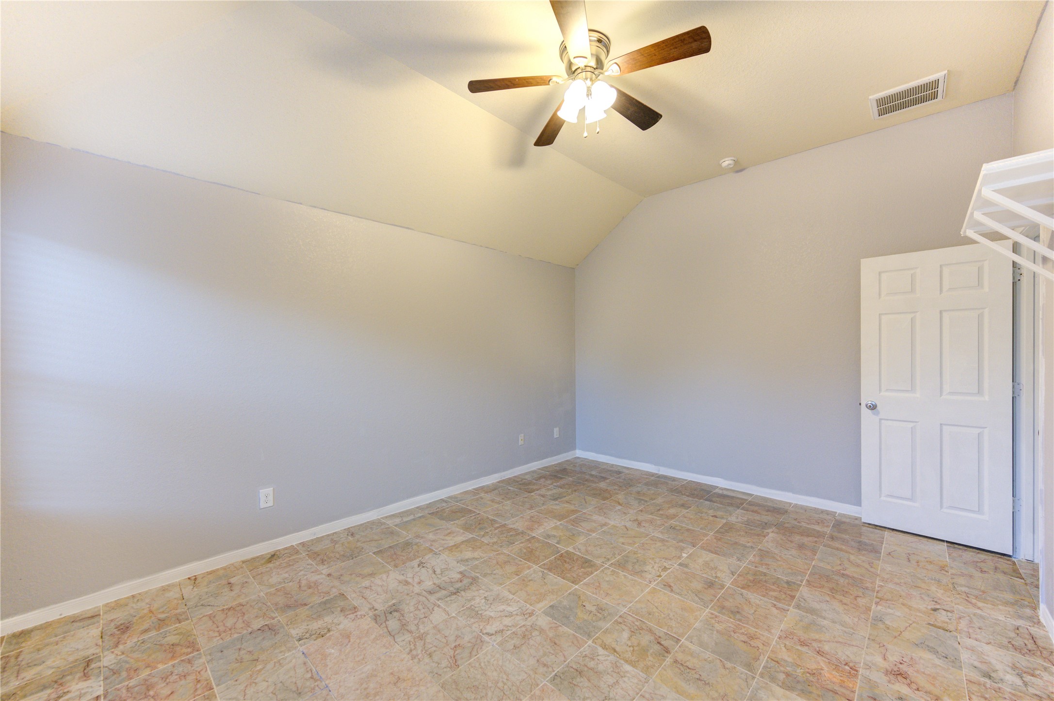 2102 Indian Clearing Trail Rosenberg, TX 77471 - Photo 19 of 29 an empty room with a ceiling fan and a window