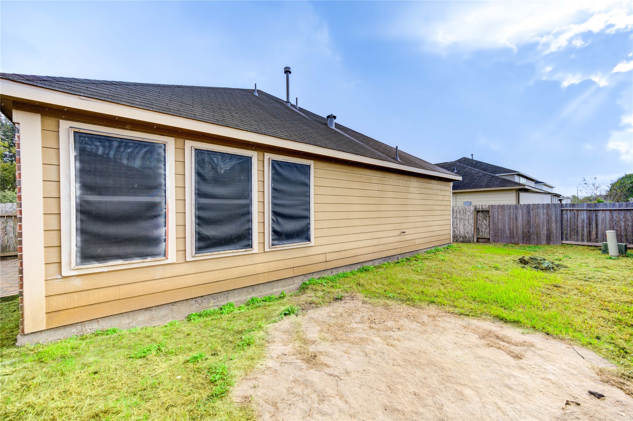 2102 Indian Clearing Trail Rosenberg, TX 77471 - Photo 29 of 29 a front view of a house with a yard