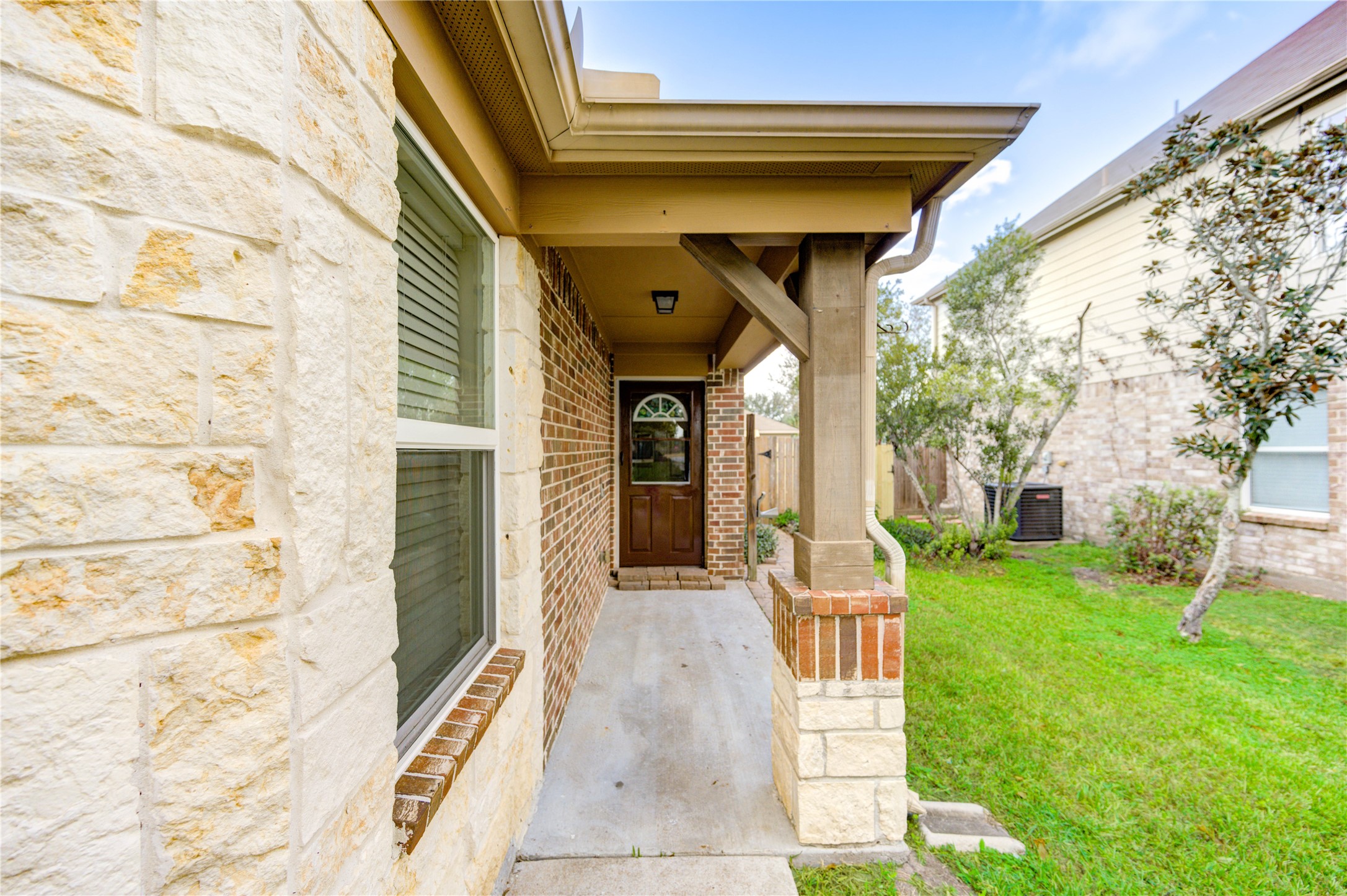 2102 Indian Clearing Trail Rosenberg, TX 77471 - Photo 4 of 29 a front view of a house with garden