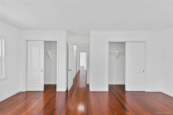 wooden floor with white walls