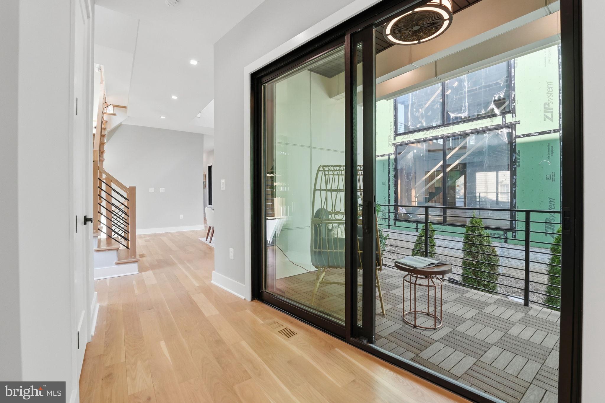 2211 Military Road Arlington, VA 22207 - Photo 15 of 107 Modern entryway with sleek glass doors.