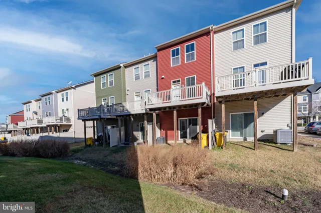 a view of a house with sitting area and furniture