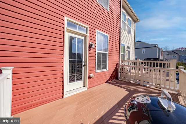 a view of a deck with a barbeque