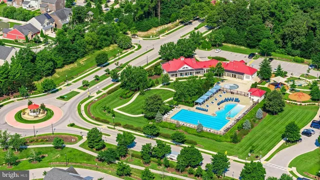 a view of a two chairs in front of a house