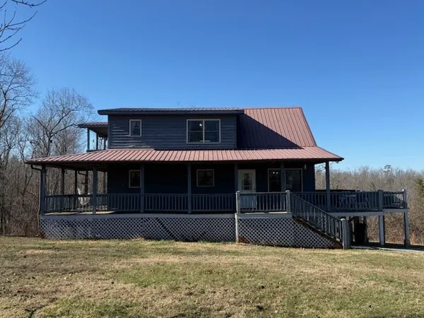 a house view with a garden space