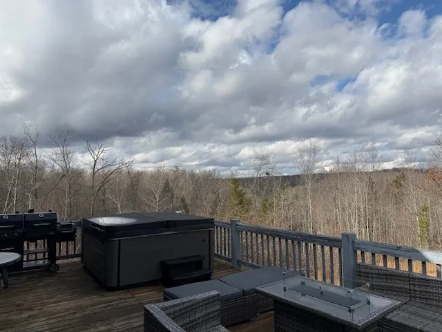a view of balcony with furniture