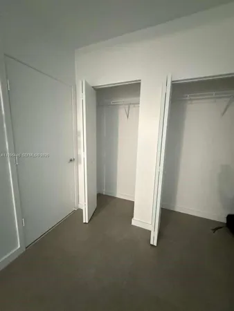 a view of a room with an empty space