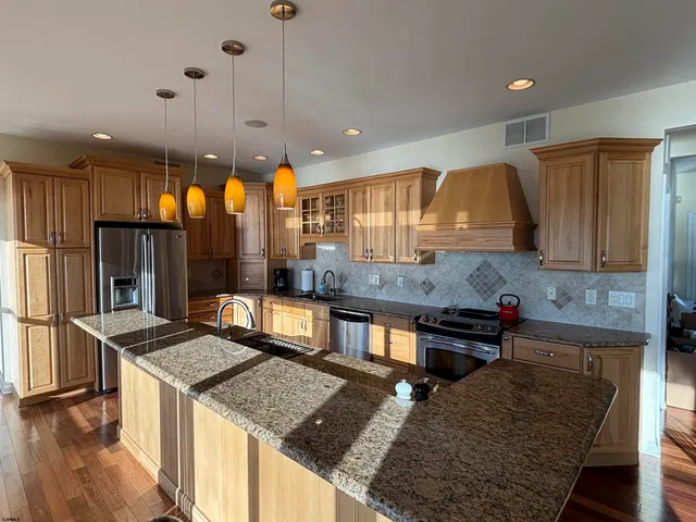a bedroom with a bed next to a window