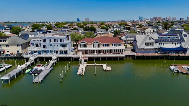a view of staircase with a potted plant on a table