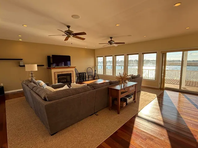 a view of balcony with wooden floor
