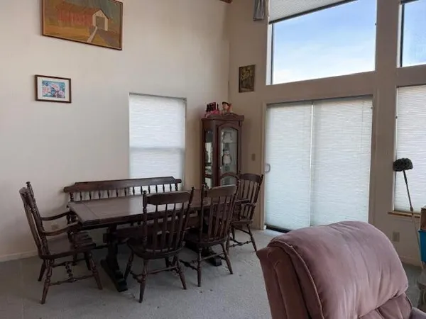 a view of a livingroom with furniture
