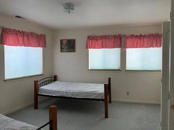 a room with furniture and window