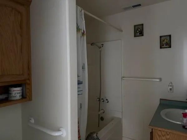 a bathroom with a sink and toilet
