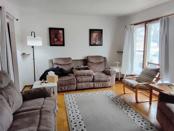 a living room with furniture and a couch