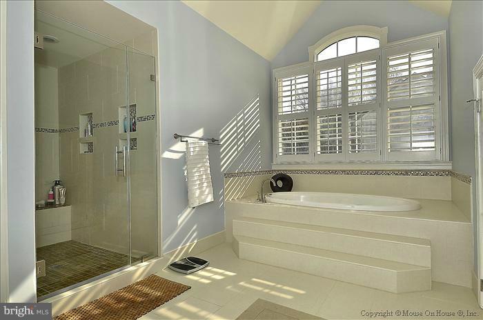 2801 Rifle Ridge Road Oakton, VA 22124 - Photo 1 of 30 a bathroom with a sink a toilet and a bathtub