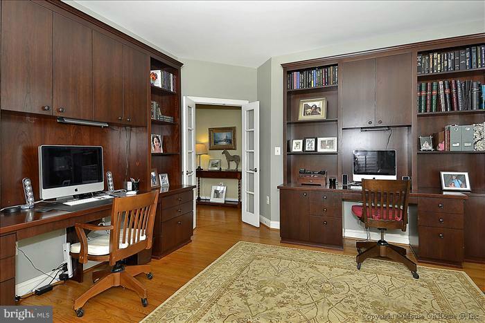 2801 Rifle Ridge Road Oakton, VA 22124 - Photo 2 of 30 a living room with furniture and a fireplace