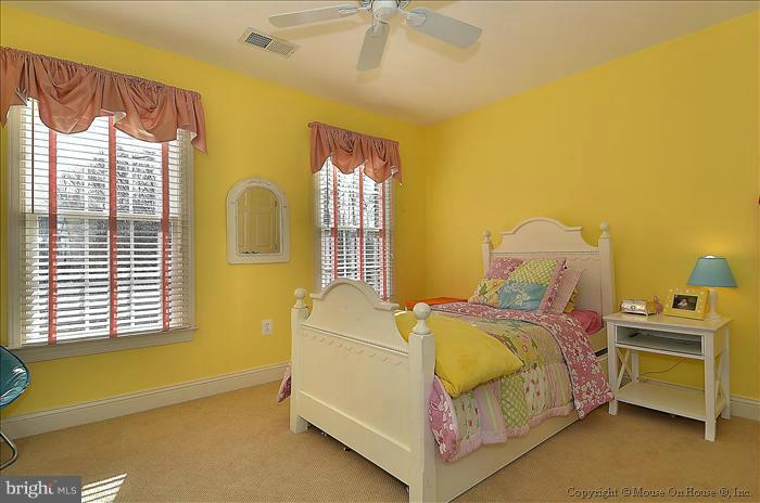 2801 Rifle Ridge Road Oakton, VA 22124 - Photo 12 of 30 a bedroom with a bed and window