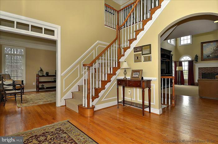 2801 Rifle Ridge Road Oakton, VA 22124 - Photo 16 of 30 a view of entryway and hall with wooden floor