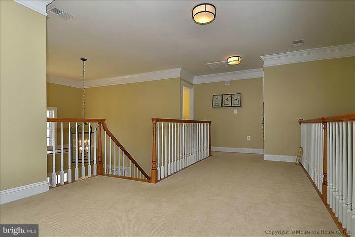 2801 Rifle Ridge Road Oakton, VA 22124 - Photo 18 of 30 a view of a hallway with a livingroom