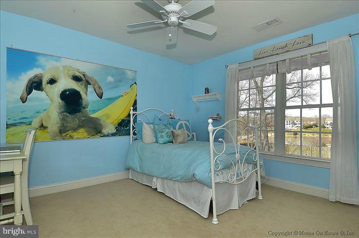 2801 Rifle Ridge Road Oakton, VA 22124 - Photo 3 of 30 a bedroom with a bed and windows