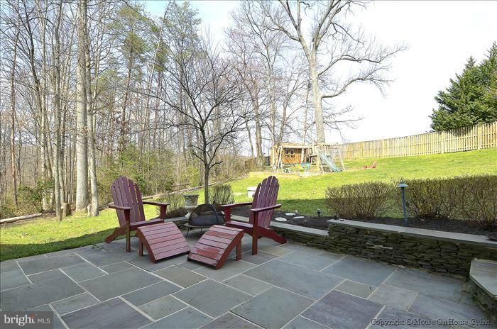 2801 Rifle Ridge Road Oakton, VA 22124 - Photo 28 of 30 a view of outdoor space with seating area and trees
