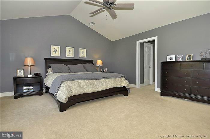 2801 Rifle Ridge Road Oakton, VA 22124 - Photo 29 of 30 a bedroom with a bed and a tv
