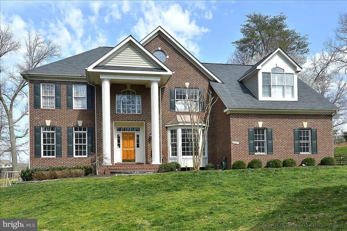 2801 Rifle Ridge Road Oakton, VA 22124 - Photo 30 of 30 front view of a house with a yard