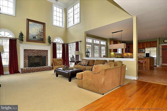 2801 Rifle Ridge Road Oakton, VA 22124 - Photo 7 of 30 a living room with furniture and a fireplace