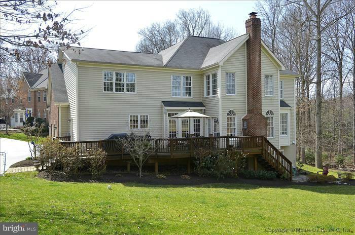 2801 Rifle Ridge Road Oakton, VA 22124 - Photo 8 of 30 a front view of house with yard and green space