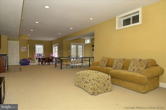 2801 Rifle Ridge Road Oakton, VA 22124 - Photo 9 of 30 a living room with furniture and a table
