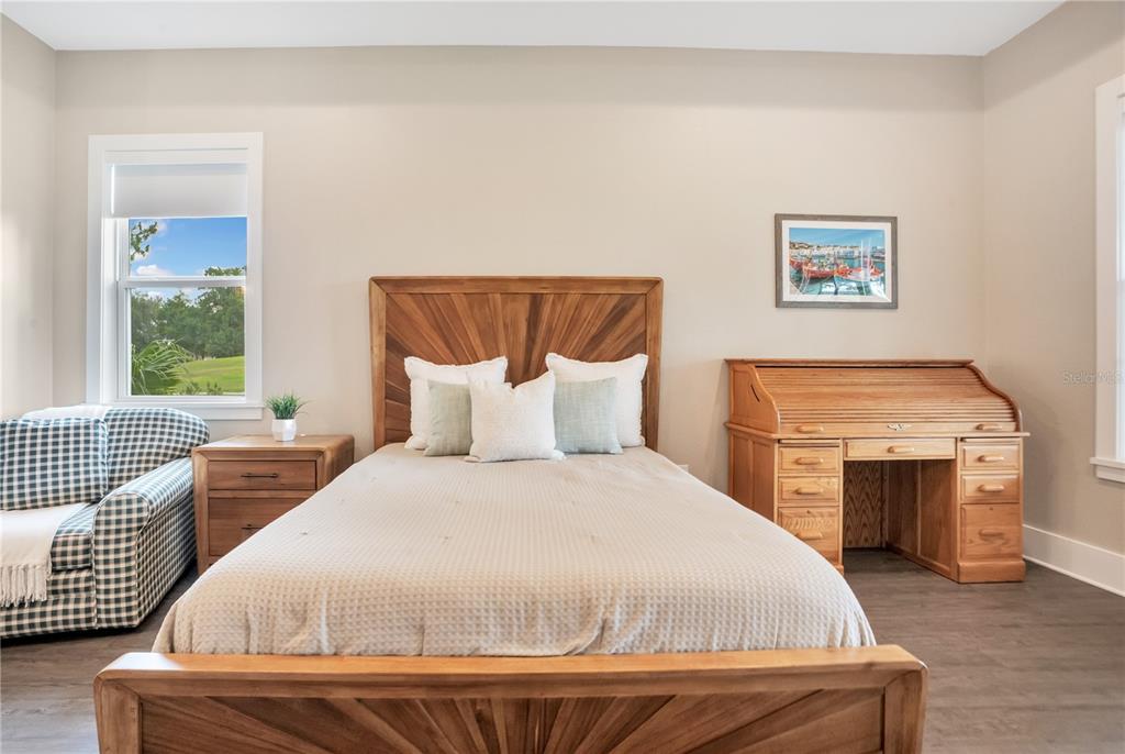 440 Palma Ceia Road Winter Haven, FL 33884 - Photo 28 of 78 a bedroom with a bed and a couch