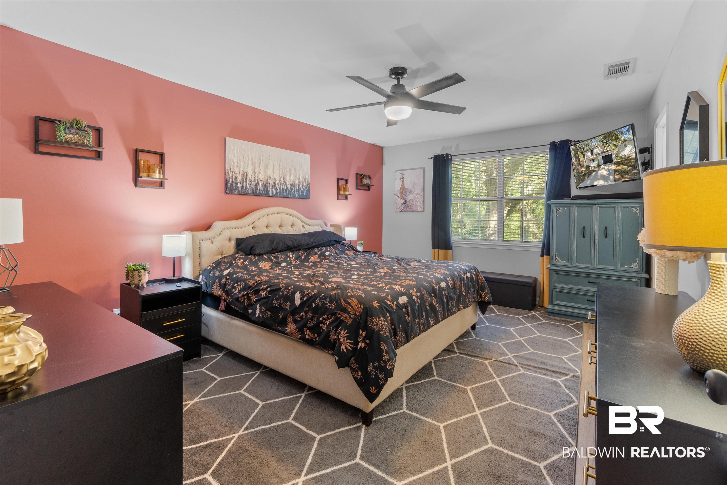 149 Montclair Loop Daphne, AL 36526 - Photo 22 of 30 Bedroom with a ceiling fan and dark colored carpet