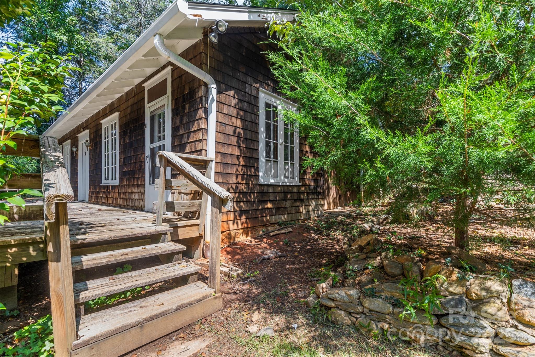 110 Vineyard Road Tryon, NC 28782 - Photo 1 of 20 a view of a house with backyard