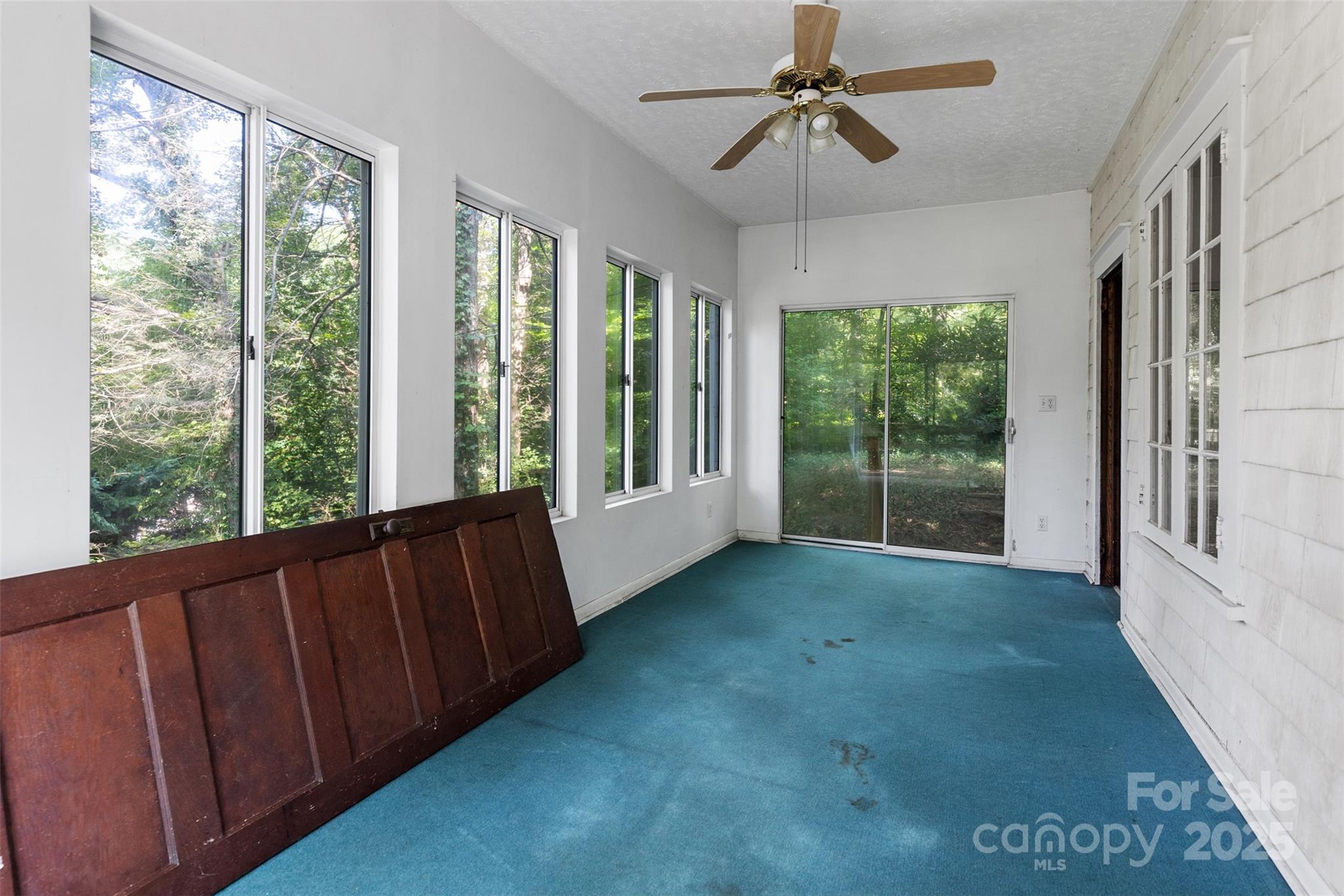 110 Vineyard Road Tryon, NC 28782 - Photo 17 of 20 a view of an empty room with a window