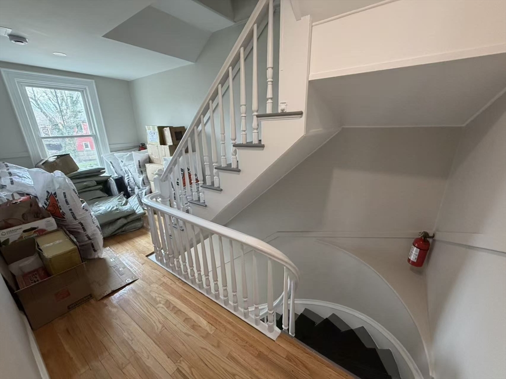 6 Channing Street, Unit 3 Newton, MA 02458 - Photo 12 of 12 a view of entryway and hall with wooden floor