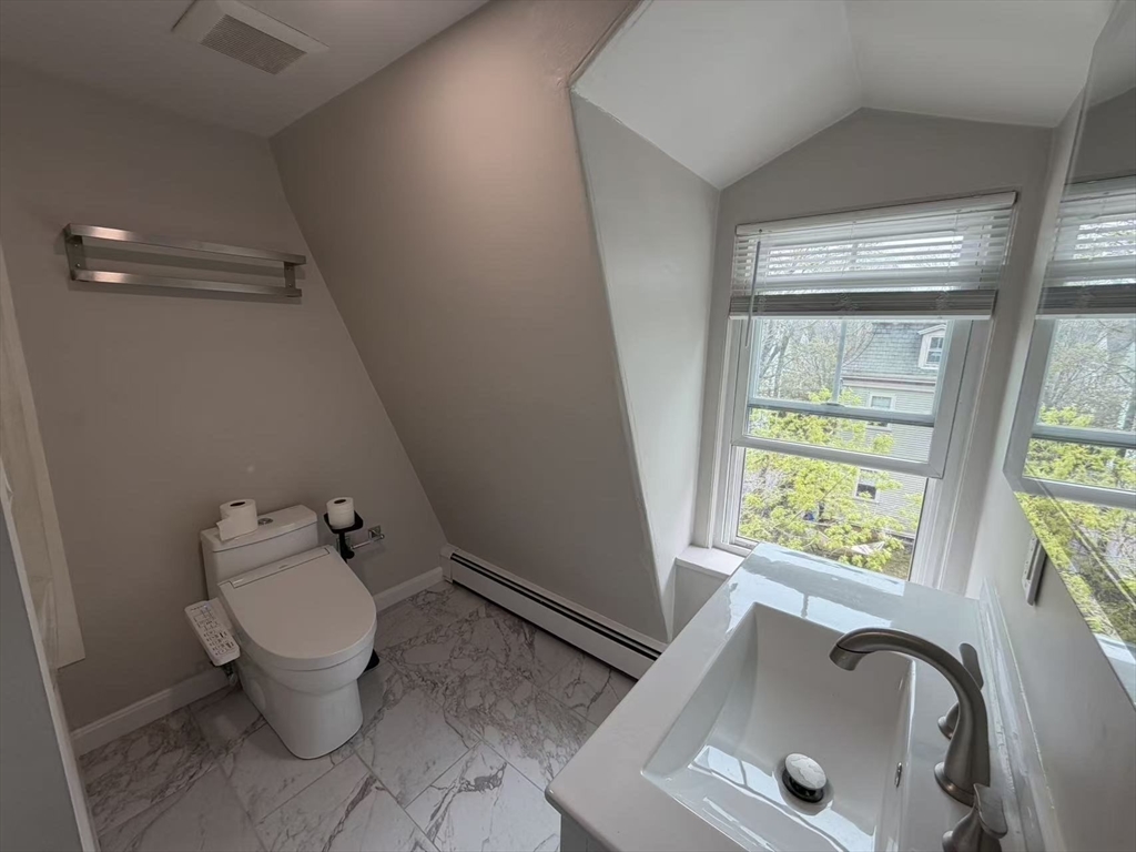6 Channing Street, Unit 3 Newton, MA 02458 - Photo 5 of 12 a bathroom with a sink and a toilet